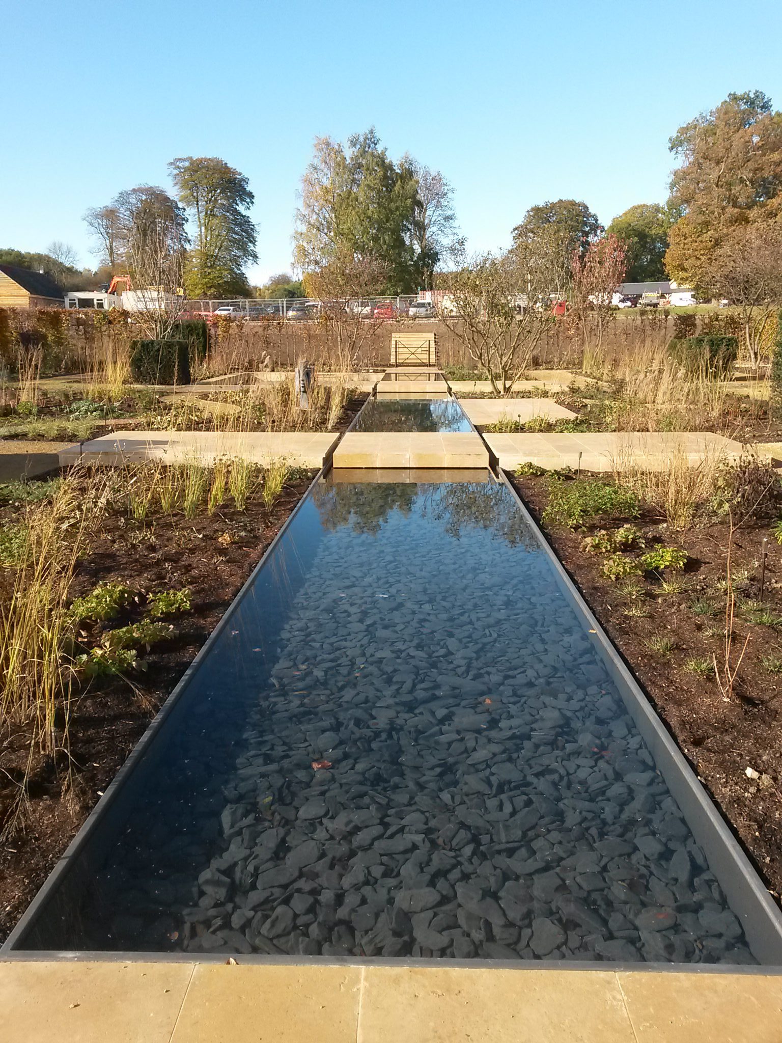 The 7306 Country Estate after landscaping improvements, showcasing a beautifully transformed garden.